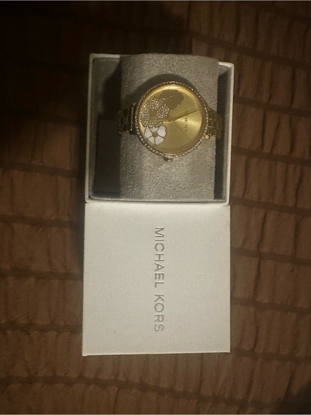 Michael Kors Gold Tone Watch with White Floral Detail